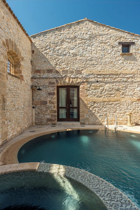 Outdoor pool, open 10:00 AM to 7:00 PM, sun loungers