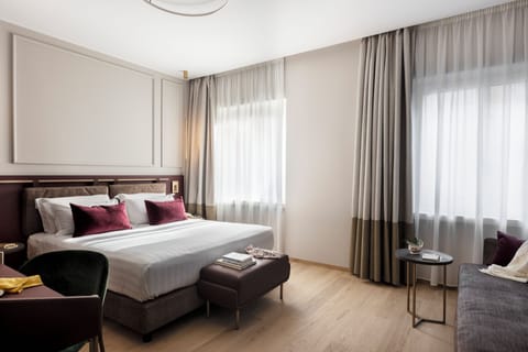 Premium bedding, down comforters, memory foam beds, in-room safe