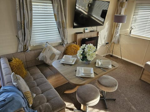 Cabin | Living area | TV, fireplace