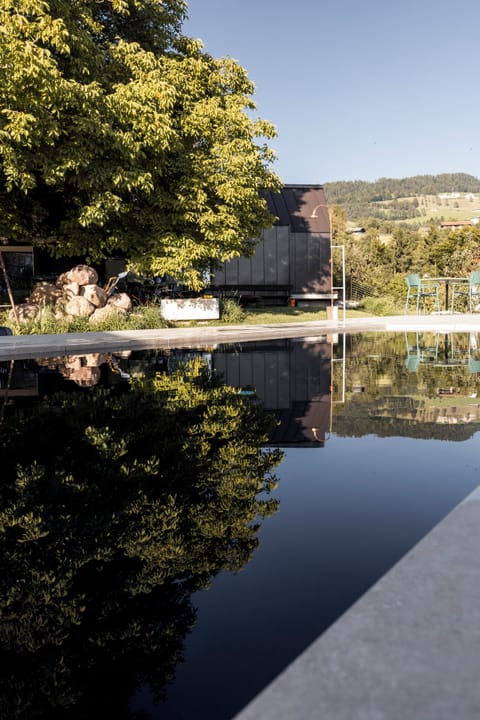 Seasonal outdoor pool, open 6:00 AM to 10:00 PM, free cabanas