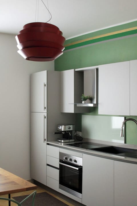 Deluxe Condo, 2 Bedrooms | Private kitchen | Microwave, stovetop, dishwasher, griddle