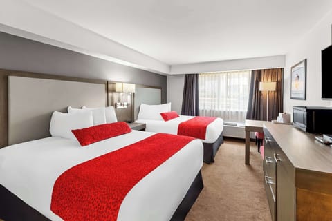 Standard Room, 2 Queen Beds, Non Smoking | Laptop workspace, blackout drapes, soundproofing, iron/ironing board