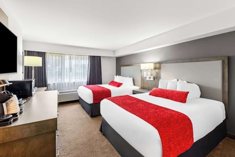 Standard Room, 2 Queen Beds, Non Smoking | Laptop workspace, blackout drapes, soundproofing, iron/ironing board