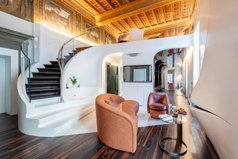 Gallery Suite | Living area | Flat-screen TV, fireplace