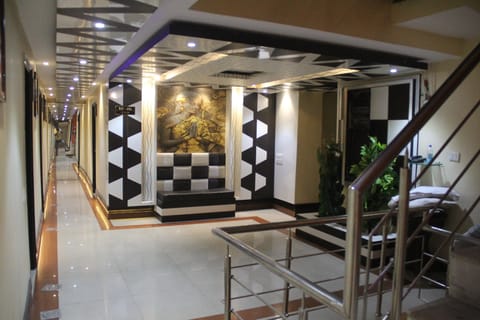 Basic Double Room | Living area | TV
