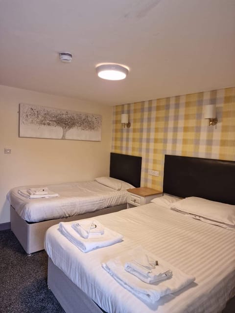 Family Room | Blackout drapes, iron/ironing board, free WiFi, bed sheets