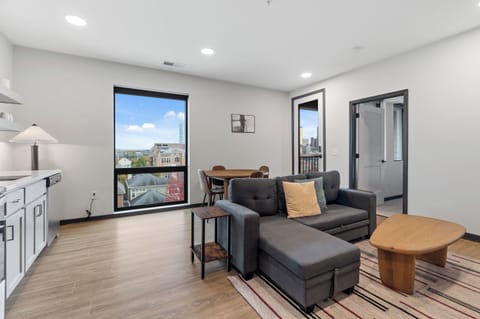 Deluxe Apartment | Living area | 42-inch Smart TV with digital channels