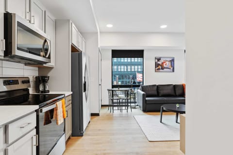 Deluxe Studio | Private kitchen | Fridge, microwave, oven, dishwasher