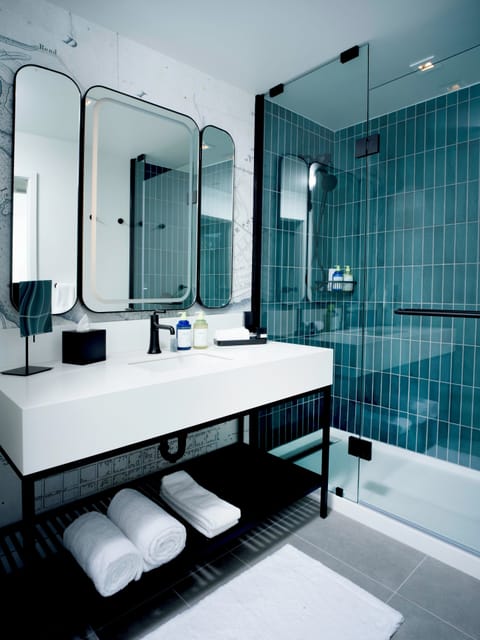 Shower, free toiletries, slippers, towels