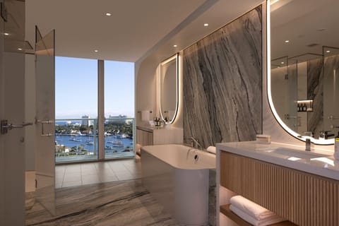 Presidential Suite | Bathroom | Rainfall showerhead, designer toiletries, hair dryer, bathrobes