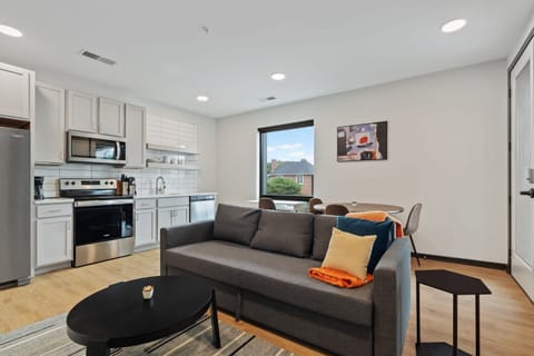 Deluxe Apartment | Living area | 42-inch Smart TV with digital channels