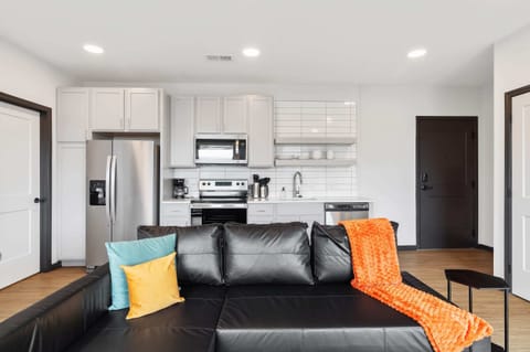 Deluxe Apartment | Living area | 42-inch Smart TV with digital channels