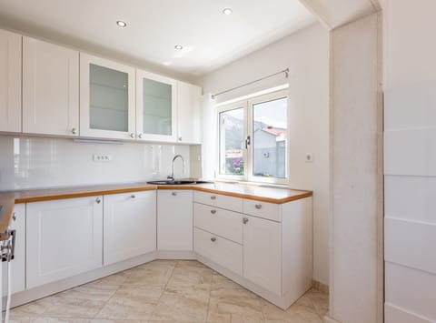 Apartment (Two Bedroom Apartment with Balcony) | Private kitchen | Fridge