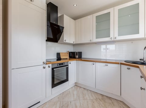 Apartment (Two Bedroom Apartment with Balcony) | Private kitchen | Fridge