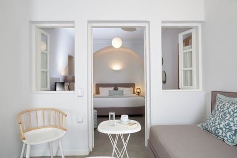 Junior Suite, Balcony, Sea View | Premium bedding, minibar, in-room safe, individually decorated