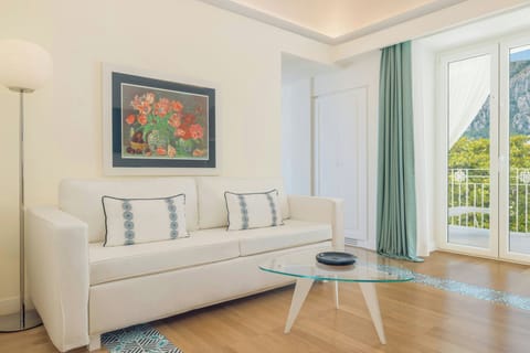 Suite, 1 Bedroom, Balcony, Sea View (Balcony) | Living room | 42-inch LCD TV with cable channels, TV