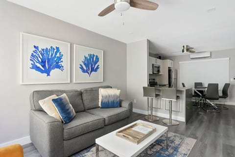 Classic Apartment, Partial Ocean View | Living area | Flat-screen TV