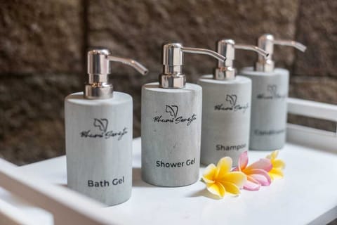 Separate tub and shower, rainfall showerhead, hair dryer, bathrobes