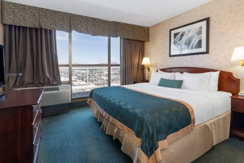 Suite, 1 King Bed, Non Smoking (One-Bedroom Suite) | In-room safe, desk, blackout drapes, iron/ironing board