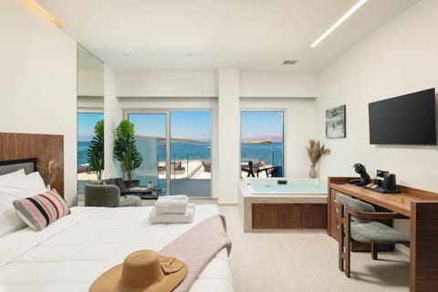 Sunlounge Seafront Suite with Indoor Hot tub | In-room safe, desk, laptop workspace, soundproofing