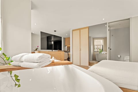 Studio Suite, City View | Living area | 55-inch Smart TV with digital channels, Netflix, streaming services
