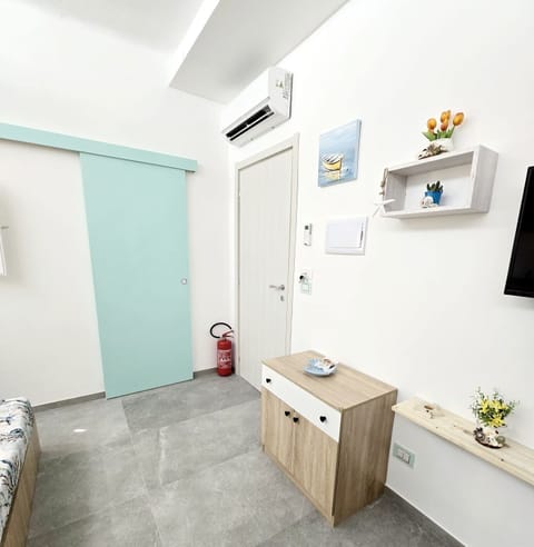 Deluxe Room, Courtyard View | In-room safe, blackout drapes, soundproofing, free WiFi