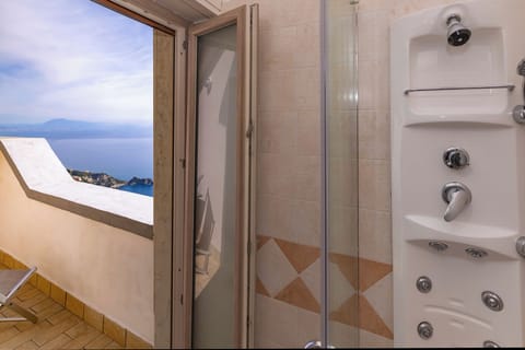 Panoramic Double Room, Balcony, Sea View | Bathroom | Shower, free toiletries, hair dryer, towels