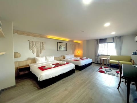 Family Room, Balcony, City View | Blackout drapes, iron/ironing board (on request), WiFi (free)