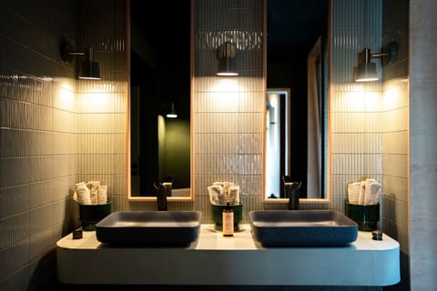 Shower, hair dryer, slippers, towels