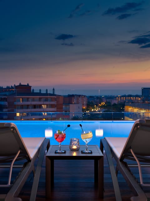 2 outdoor pools, pool umbrellas, sun loungers