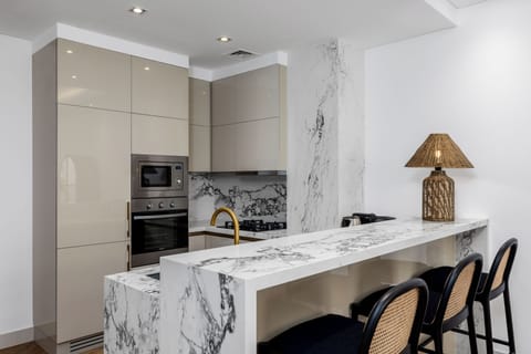 Classic Apartment, Balcony, Sea View | Private kitchen | Fridge, microwave, oven, stovetop