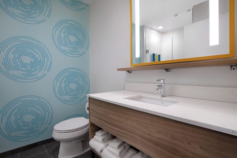 Combined shower/tub, hair dryer, towels, soap