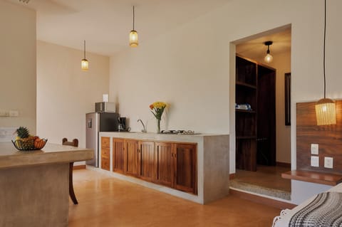 Standard Studio Suite | Private kitchen | Mini-fridge, microwave, espresso maker, cookware/dishes/utensils