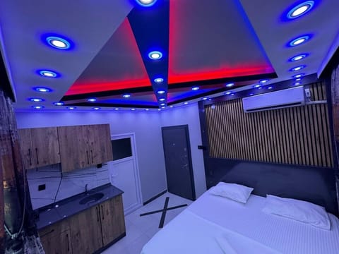 Deluxe Studio Suite, City View | Desk, free WiFi