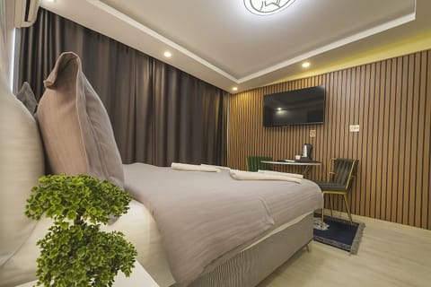 Standard Room | Premium bedding, desk, laptop workspace, soundproofing
