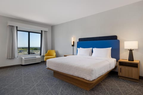 Down comforters, desk, laptop workspace, blackout drapes