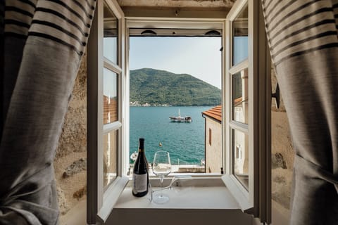 Junior suite with a sea view | In-room safe, desk, laptop workspace, iron/ironing board