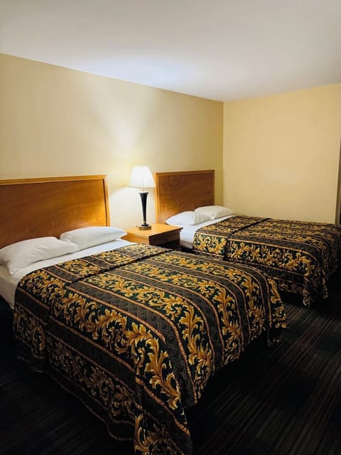 Basic Room, Non Smoking, Private Bathroom | Desk, laptop workspace, WiFi (free), bed sheets