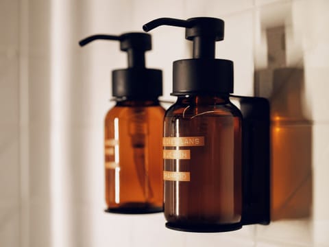 Shower, eco-friendly toiletries, hair dryer, towels