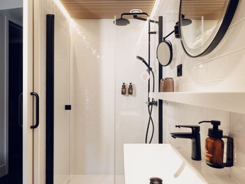 Shower, eco-friendly toiletries, hair dryer, towels