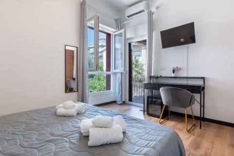 Deluxe Quadruple Room, Garden View | Soundproofing, iron/ironing board, free WiFi