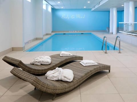Indoor pool, open 7:00 AM to 11:00 PM, sun loungers