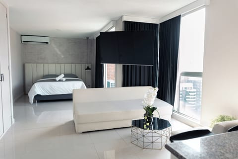 Comfort Apartment, City View | 1 bedroom, in-room safe, blackout drapes, iron/ironing board