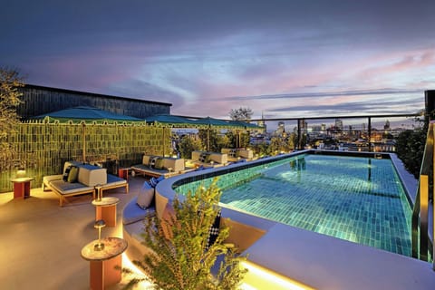 Outdoor pool, open 9:00 AM to 6:00 PM, pool umbrellas, sun loungers