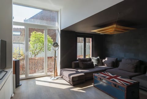 Deluxe Apartment, 1 Bedroom | Living area | Flat-screen TV