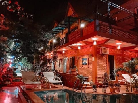 Deluxe Double Room, Pool View | Individually decorated, desk, blackout drapes, soundproofing