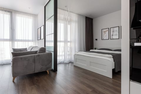 Comfort Studio, City View | Living area | 20-inch TV with satellite channels