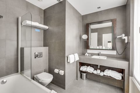 Deluxe Double Room | Bathroom | Designer toiletries, hair dryer, bathrobes, towels