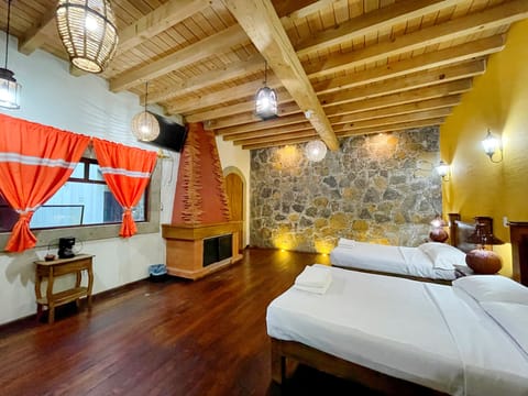Family Quadruple Room, Courtyard View | Desk, laptop workspace, iron/ironing board, free WiFi