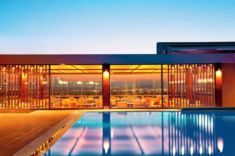 Seasonal outdoor pool, pool umbrellas, sun loungers